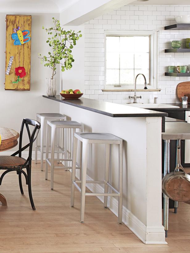 Una cocina con personalidad y estilo Imagen de cosina comedor con barra