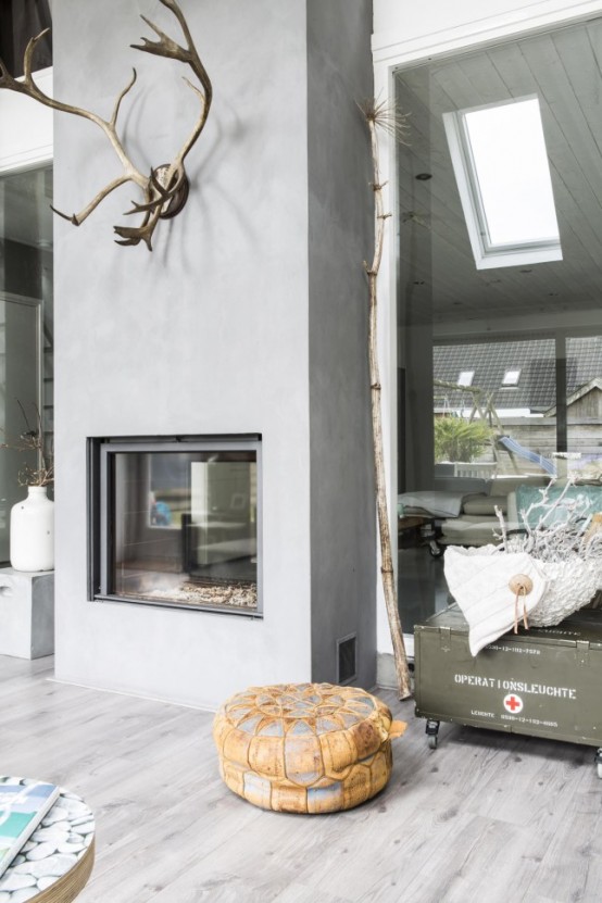 Vintage, industrial y rústico en una casa de campo holandesa Chimenea estilo industrial